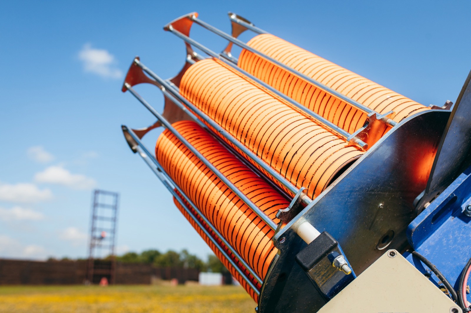 Orange clays stacked in a trap on a shooting ground